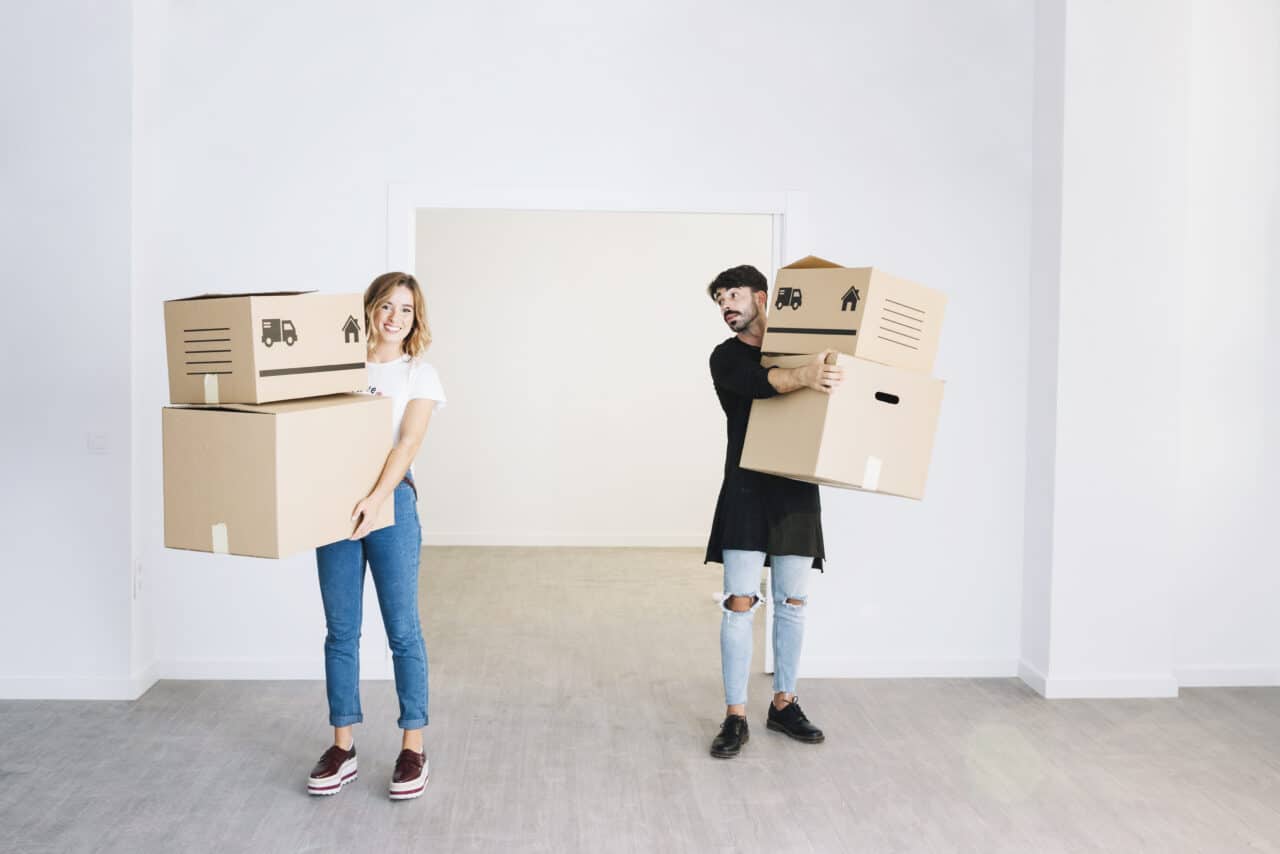 People holding moving boxes