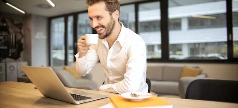 A man looking at laptop