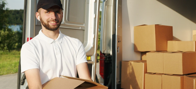 A mover carrying boxes