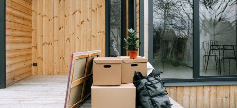 Boxes and stuff in front of house packed for a move with movers Wilton CT