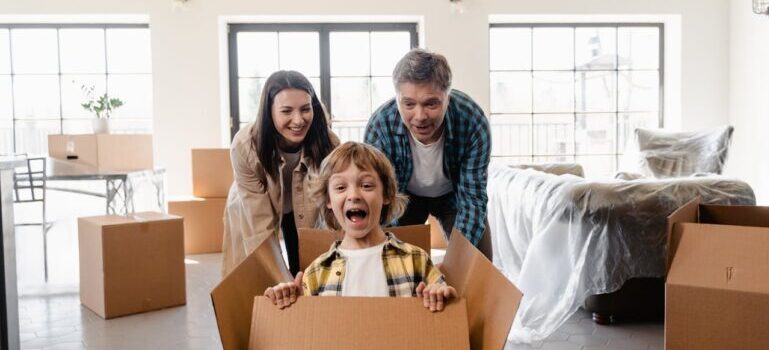 happy family after moving with movers