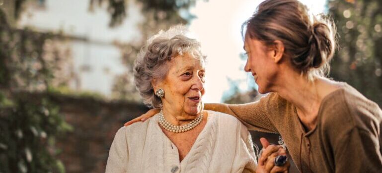 A young woman and old woman talking