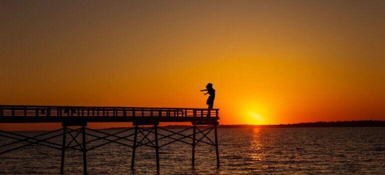 A woman standing on dock