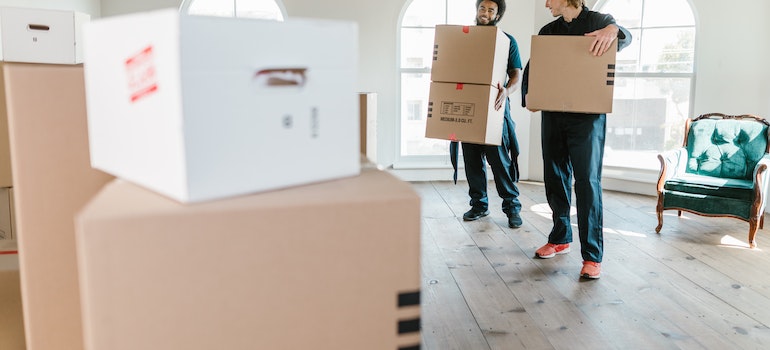 Movers with boxes