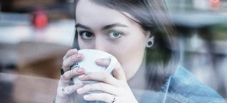 Person sipping coffee