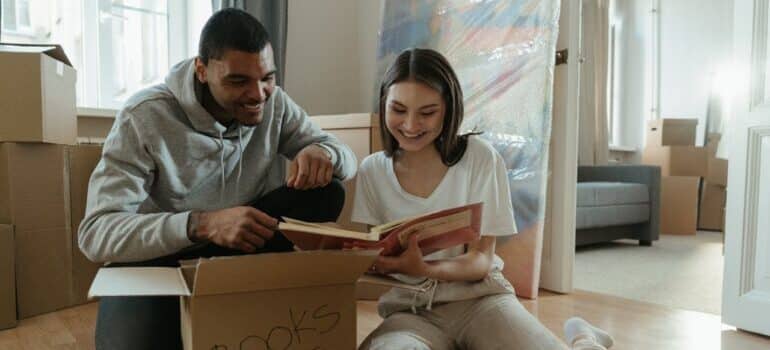 Man and Woman Sitting on Couch