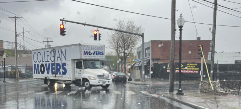 same day movers driving a Collegian Movers truck in Bridgeport CT