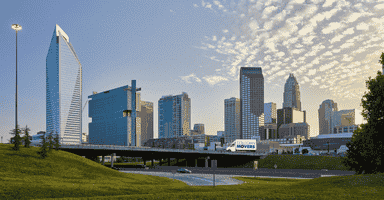 Collegian Movers truck on bridge moving client to North Carolina.