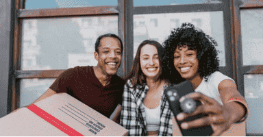 three people taking selfie while waiting for movers Westport CT has to offer