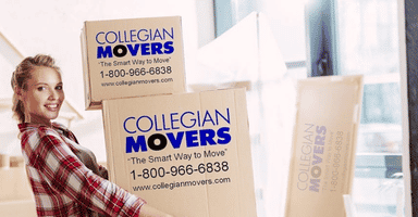 Girl carrying Collegian Movers boxes in an apartment.